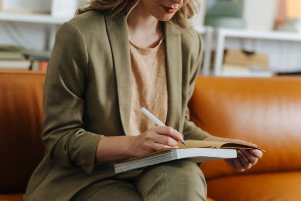 istock An Anonymous Businesswoman Writing Notes in the Office 1344481495