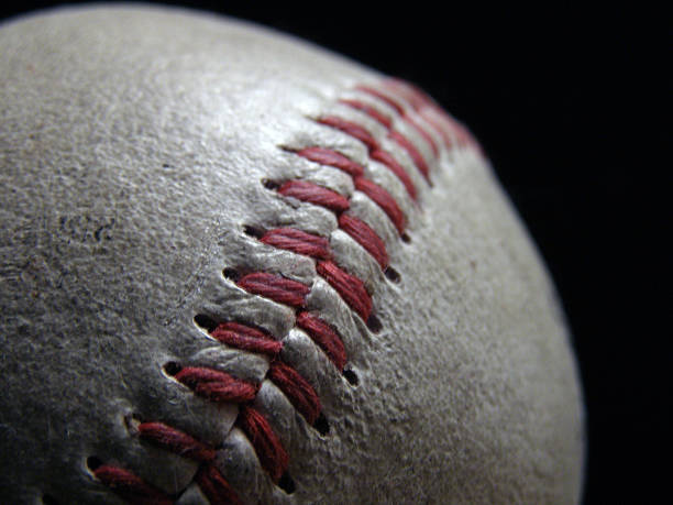 Baseball Closeup of baseball stitching. scoreboard stadium sport seat stock pictures, royalty-free photos & images