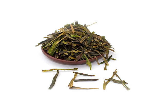 istock Green tea leaves with the word "tea" 134448353