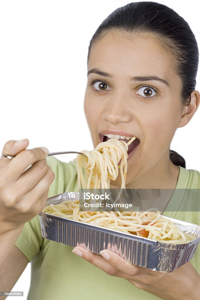 Dziewczynka jedzenie spaghetti - Zbiór zdjęć royalty-free (Dziecko)