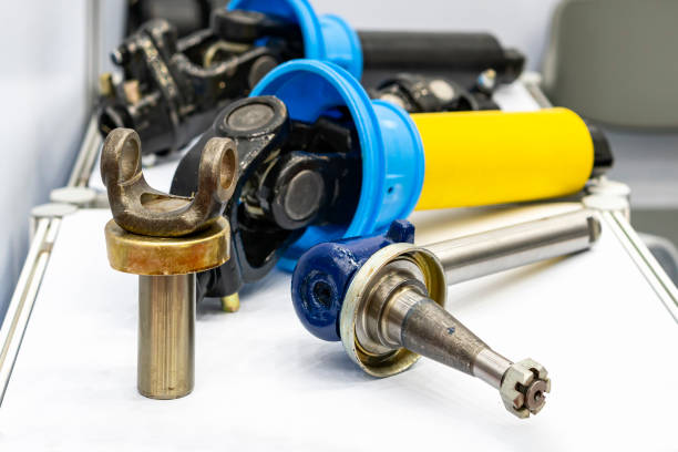 istock Various new automobile parts suspension device system universal joint and control arms spindle needle shaft tie rod ends on table 1344497740