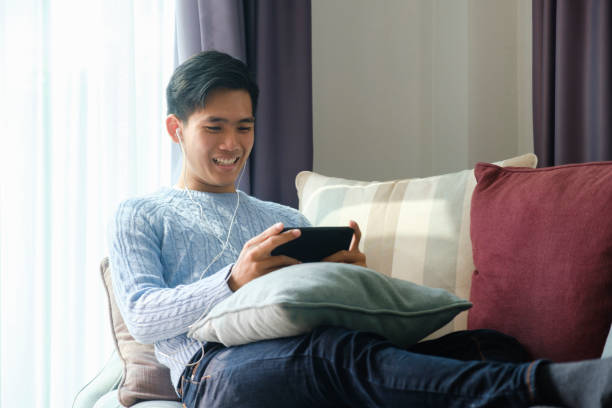 istock Young Man Enjoying Favorite Playlist . 1344504277