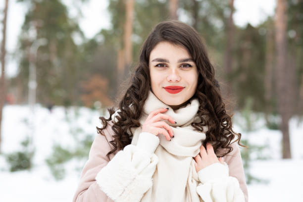 istock Glorious lady with long hair walking in the forest 1344504982
