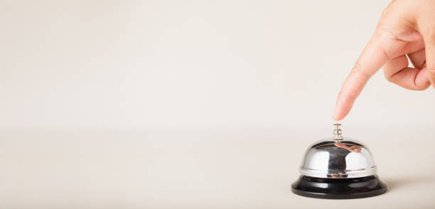 istock Bell call for service with hand 1344504984