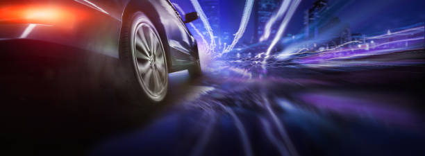 istock Sport car wheel drifting on night 1344505009