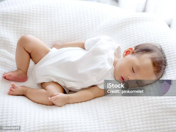 Close Up Sweet Cute Adorable Asian 3 Months Years Old Baby Girl Sleeping On White Bed Newborn Peace Sleeping Concept Stock Photo - Download Image Now