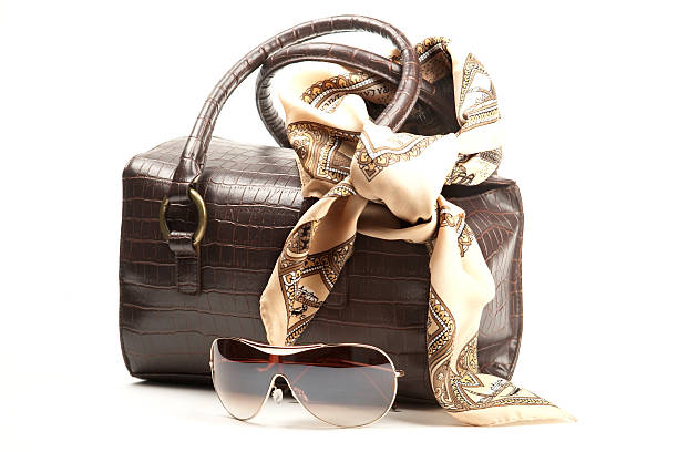 Brown bag, spectacles and scarf stock photo