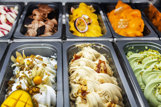 istock ice cream with different flavors, in trays in the refrigerator 1344537321