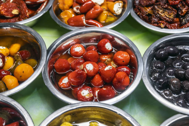 istock pickled olives with different fillings, pepper stuffed with cheese and other pickled vegetables 1344537355