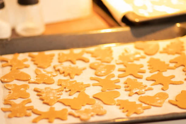 istock happy new year and christmas, figures for baking on a baking sheet 1344537504