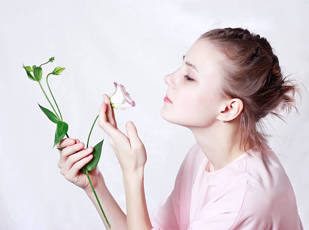 istock girl with flower 134453822