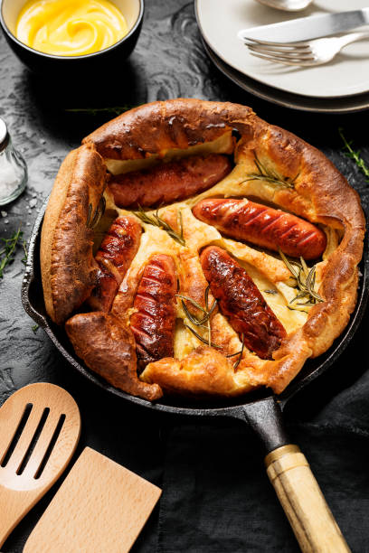 istock Toad in the hole, Sausage Toad, traditional English dish 1344538288