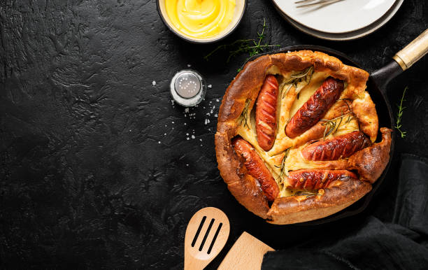 istock Toad in the hole, Sausage Toad, traditional English dish 1344538291