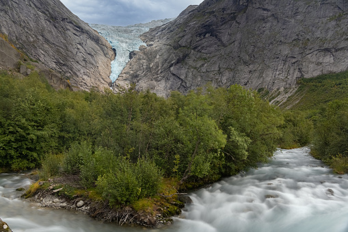 Hiking to Briksdalsbreen (Briksdal glacier), one of the most accessible arms of the Jostedalsbreen glacier, Jostedalsbreen National Park, Vestland, Norway.