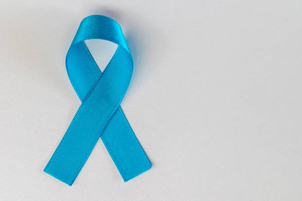 blue ribbon on white background. blue november. prostate cancer prevention month. men's health. - november imagens e fotografias de stock
