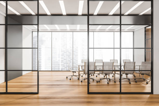 istock Panoramic conference room with black framed glass wall partitions 1344551608