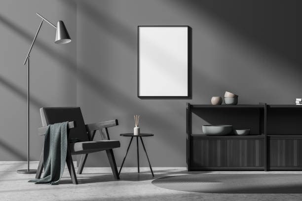 istock Dark living room interior with white empty poster and armchair 1344552029