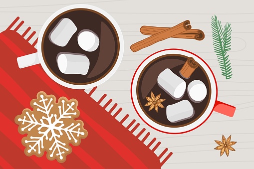 Two cups of hot drink on wooden table with red napkin with snowflake gingerbread cookie, spices. Hot Chocolate or coffee with marshmallow, cinnamon and anise. Merry Christmas or new year background.
