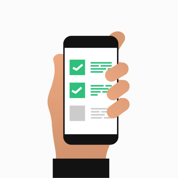 istock Hand holding smartphone with checklist on screen. Mobile phone and to do list checkboxes, feedback, survey or online quiz. 1344558667