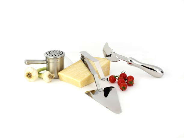 istock Stainless steel kitchen utensils with cheese,tomatoes and garlic 1344564121