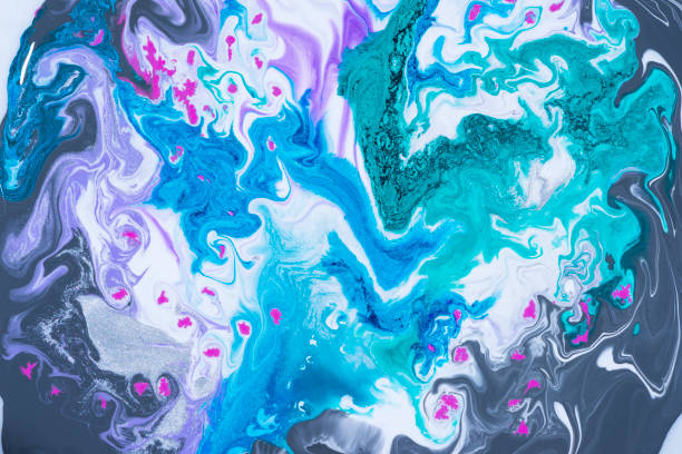 Liquid color mixing under water. Multi-colored background. Underwater texture macro shot. stock photo