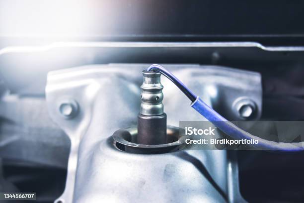 Oxygen Sensor O2 On The Header Exhaust Pipe Stock Photo - Download Image Now - Sensor, Car, Oxygen