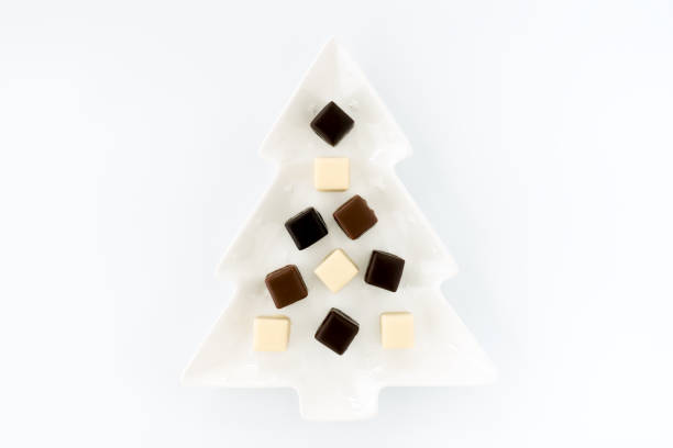 istock Dominosteine, German Gingerbread on Christmas Plate isolated on White 1344567727