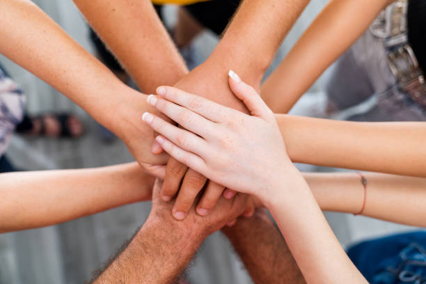 istock Hands of a group people who make teamwork for success to achievement 1344568023