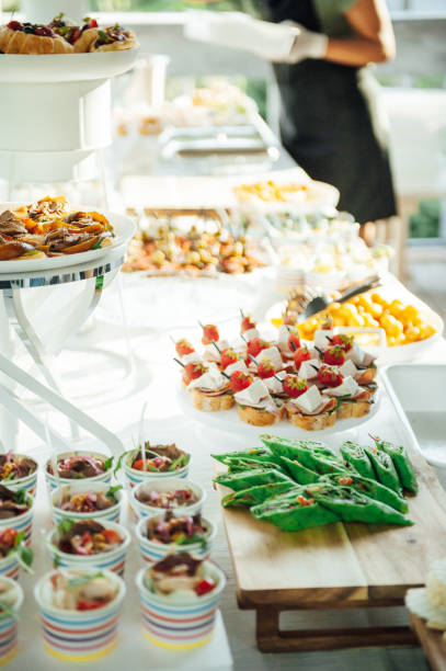 istock Buffet table of reception with cold snacks, meat and salads 1344570868