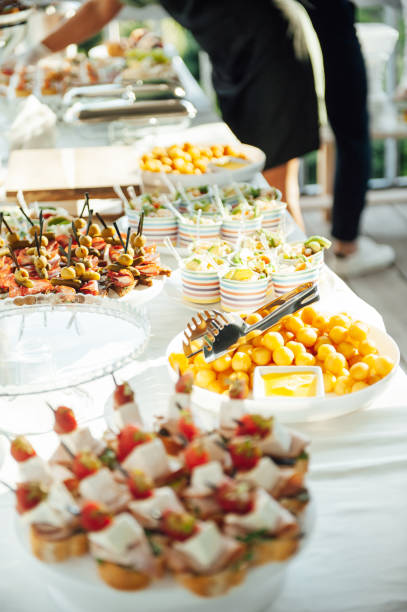 istock Buffet table of reception with cold snacks, meat and salads 1344570878