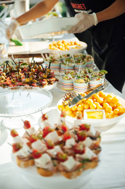 istock Buffet table of reception with cold snacks, meat and salads 1344570885