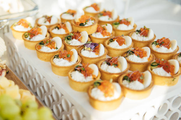istock Buffet table of reception with cold snacks, meat and salads 1344570935
