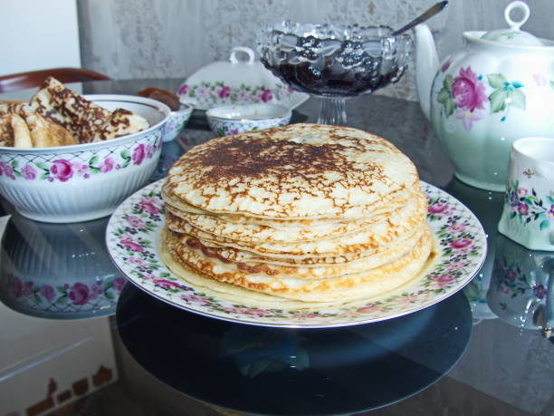 istock Traditional russian blini. Pancakes. Pancake week. Maslenitsa is an Eastern Slavic traditional holiday, celebrated during the week before the Great Lent. 1344572680