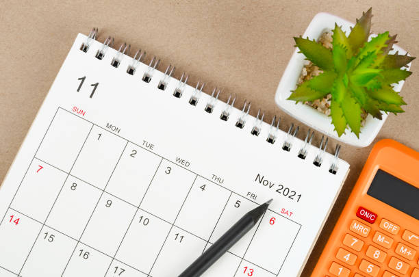 istock November 2021 desk calendar with calculator 1344574973