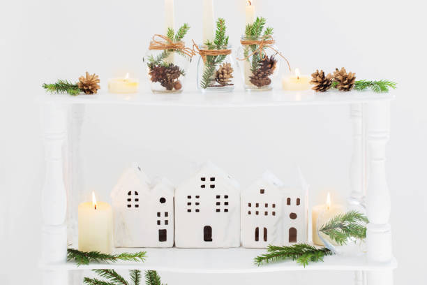 istock home christmas decor with burning candles in whte interior 1344575947