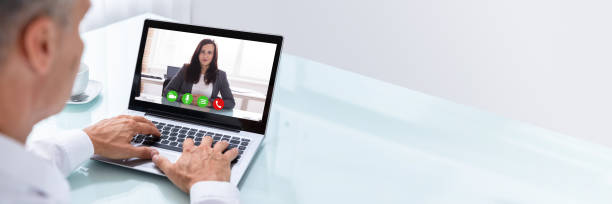 istock Businessman Videoconferencing With Colleague On Laptop 1344576874
