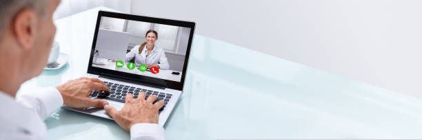 istock Businessman Videoconferencing With Doctor On Laptop 1344576877