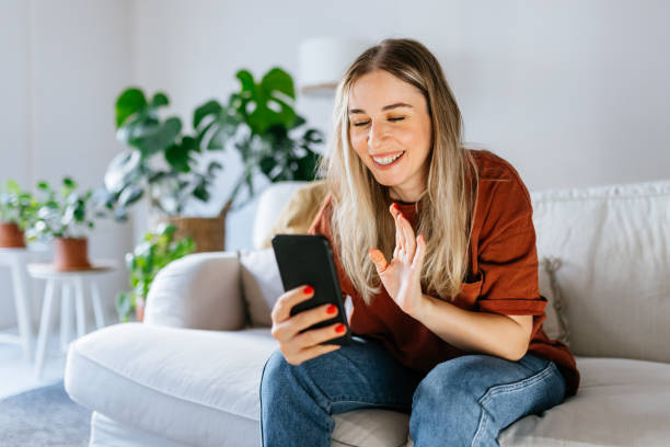 istock Young woman looking at digital tablet 1344577111