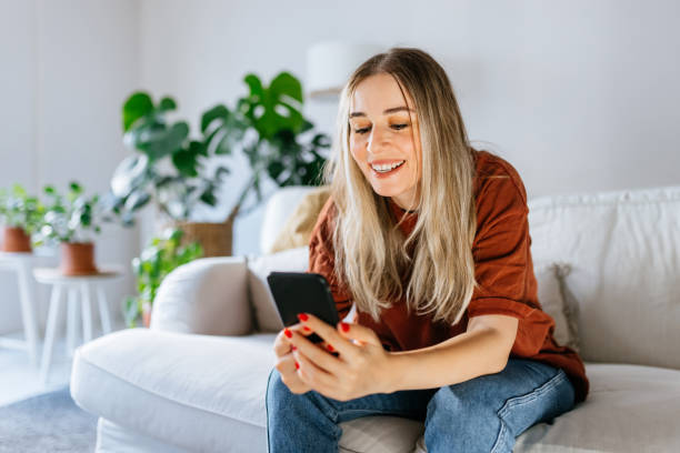 istock Young woman looking at digital tablet 1344577165