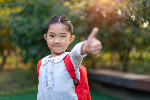 istock Little Girl Thumbs Up 1344577998
