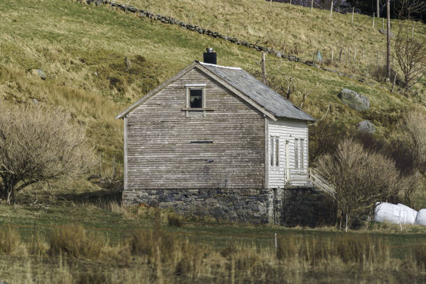 istock Little white old abandoned house. 1344582856