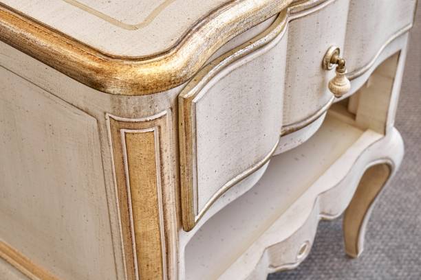 istock Nightstand in classical style with drawers in room 1344583593