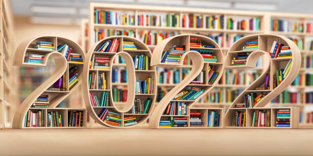 2022 new year education concept. Bookshelves with books in the form of text 2022 in library. stock photo