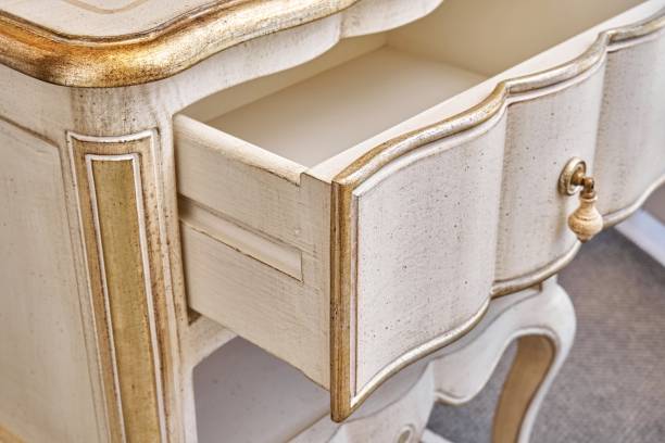 istock Nightstand in classical style with open drawer in room 1344584014