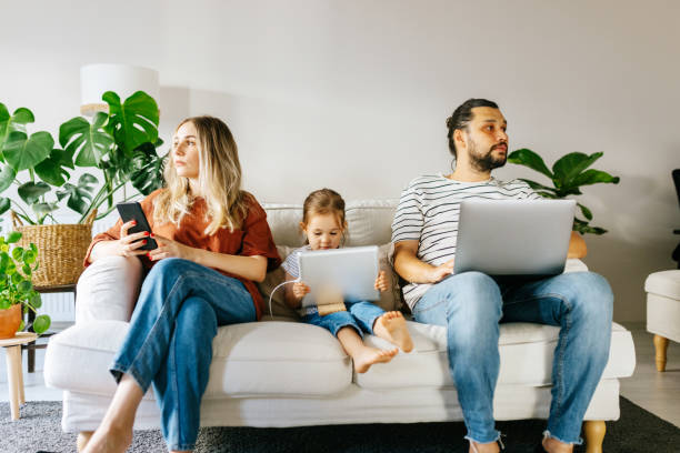 istock Family spend free time at home surfing internet 1344584987