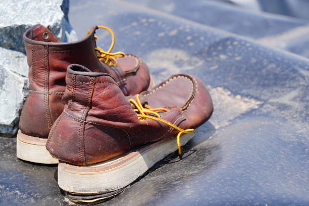 istock Old leather travel vintage boots shoes 1344586242