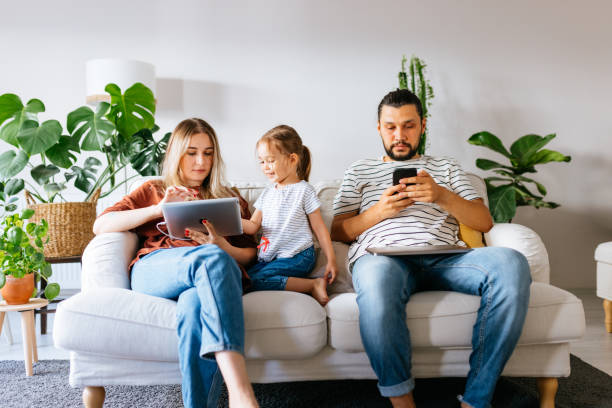 istock Family spend free time at home surfing internet 1344586646