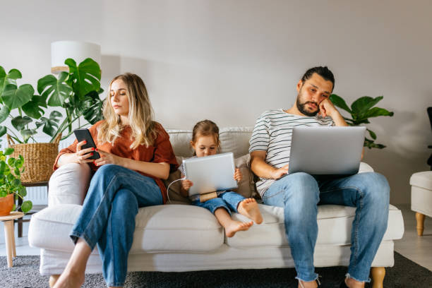 istock Family spend free time at home surfing internet 1344586696