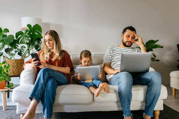 istock Family spend free time at home surfing internet 1344586801