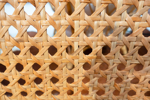 Lots of different woven wicker baskets on the ground.